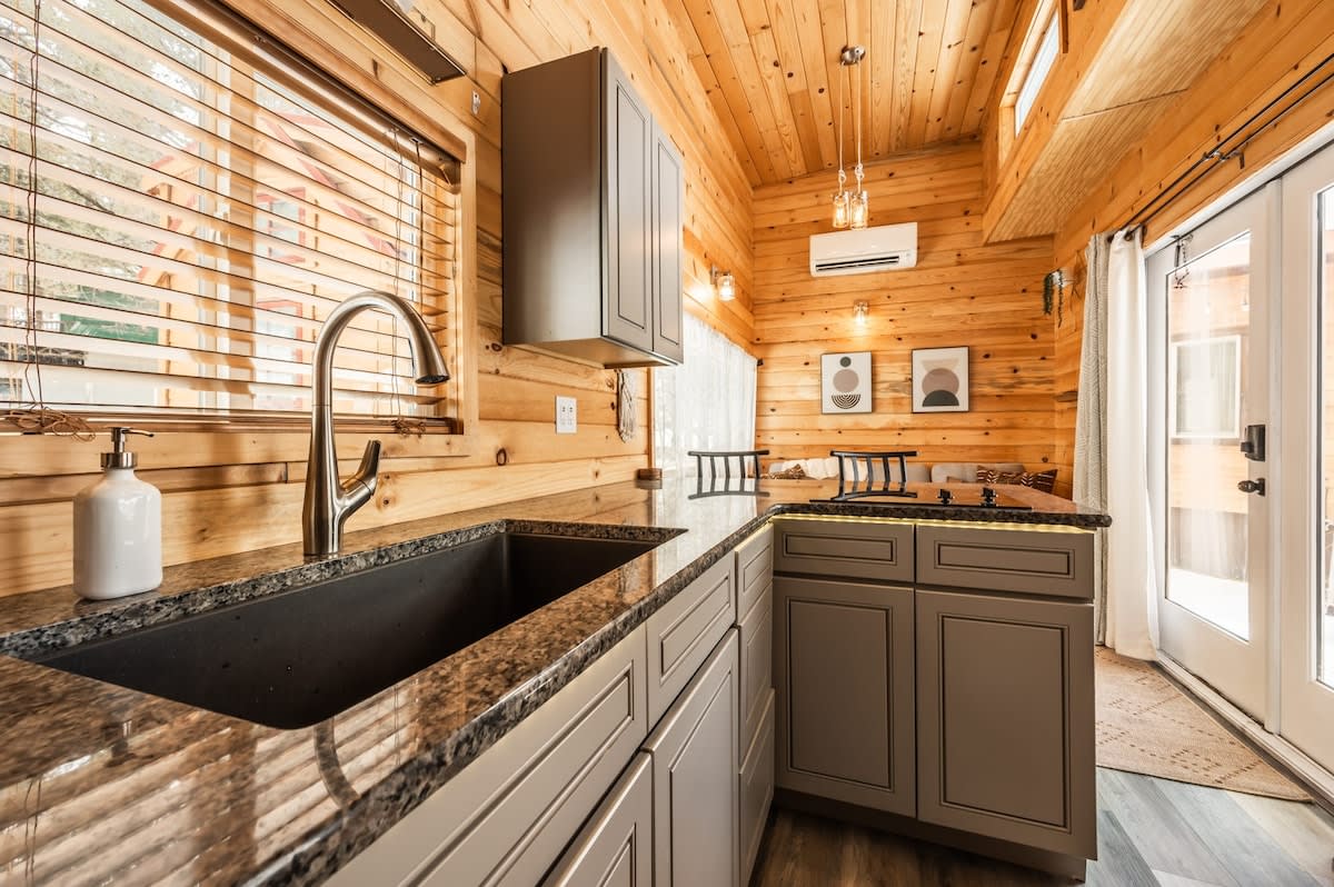 Pikes Peak BrightStar Boutique tiny home interior with modern amenities in Woodland Park CO