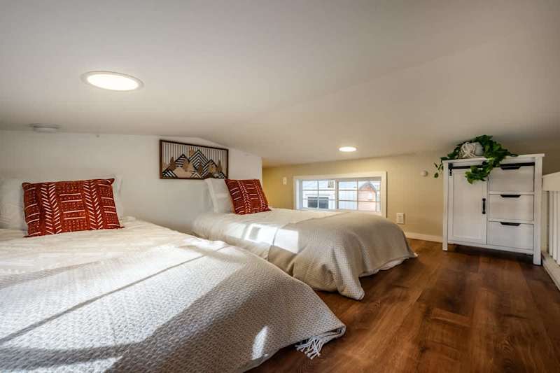 Loft bedroom (4.5ft high)with two twins bed.